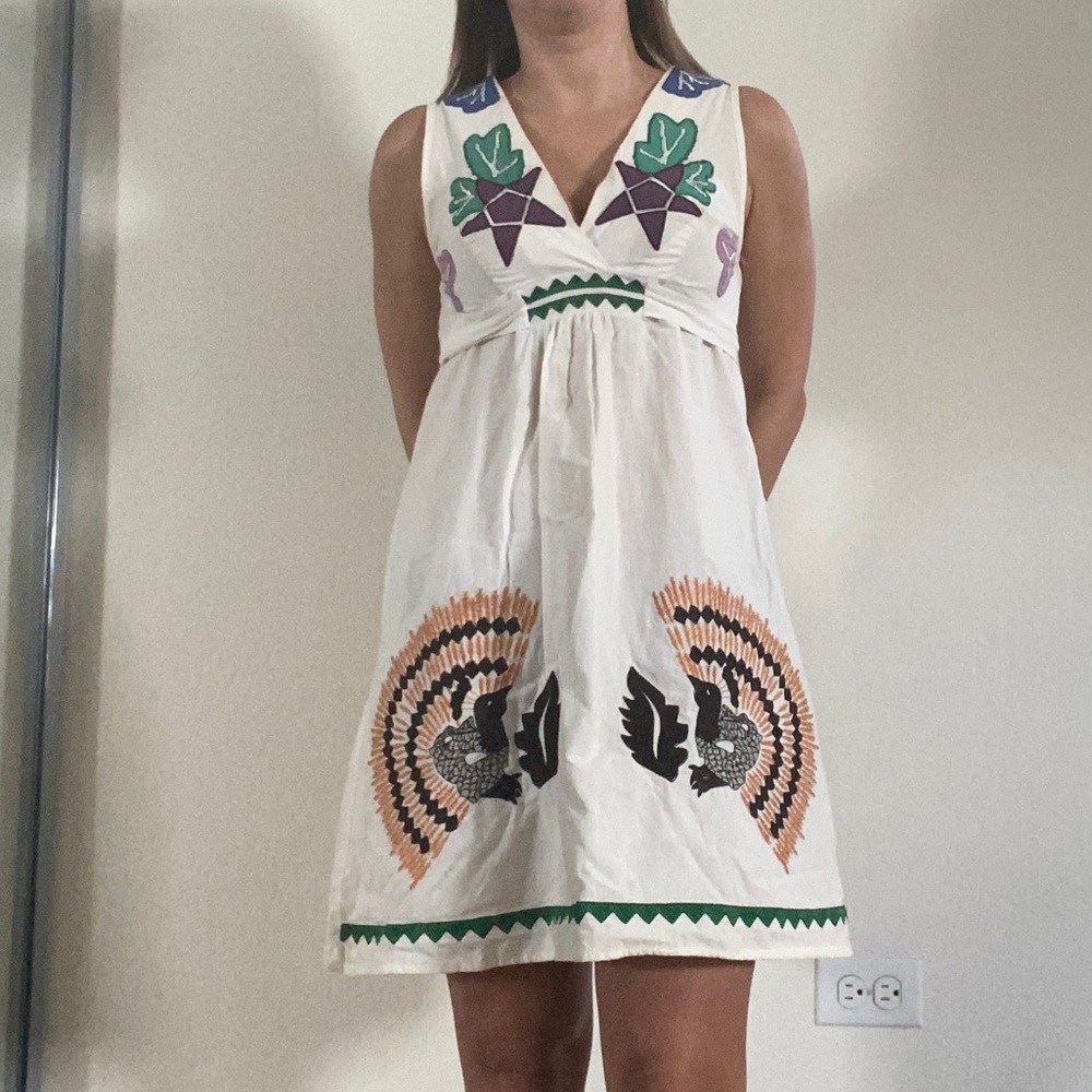 White dress with embroidered details